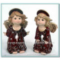 red antique porcelain angel figurines
